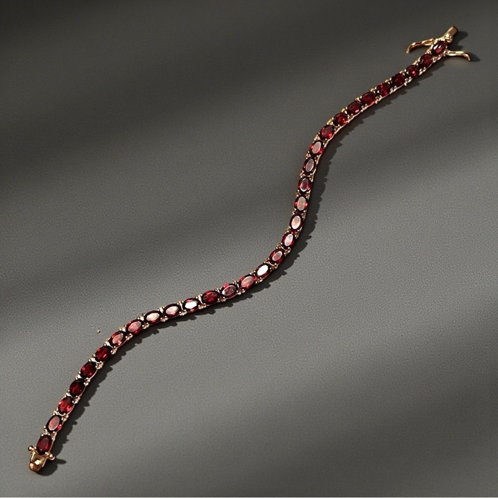 Stunning Garnet Gold Over Sterling Tennis 8” Bracelet